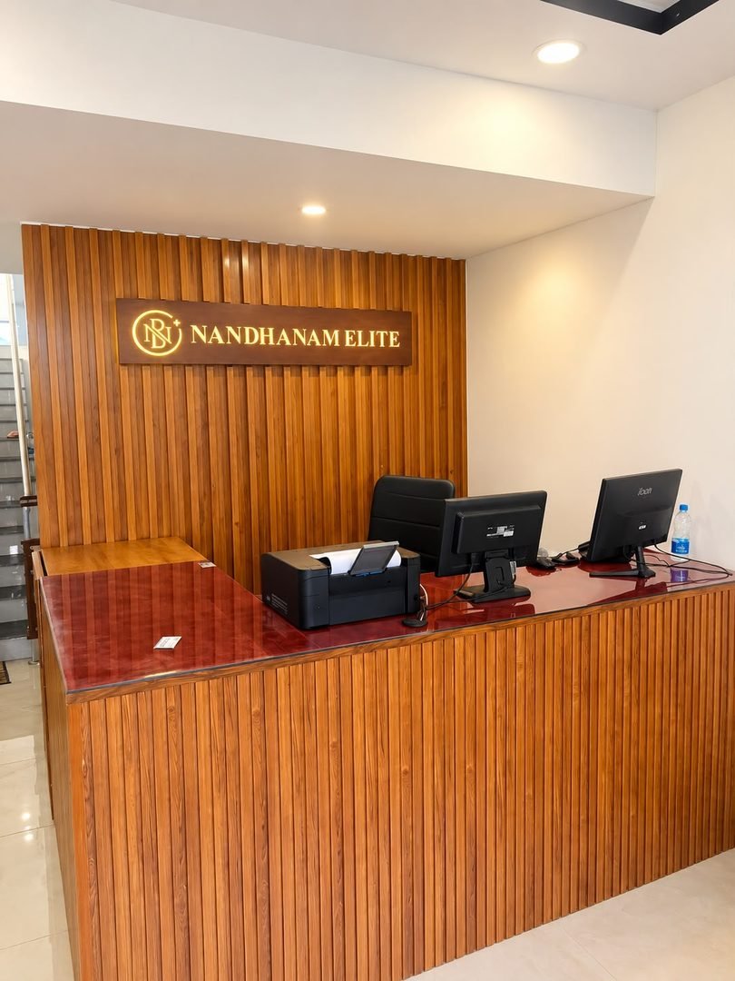 Nandhanam Elite Reception Desk with Teak Wood Panelling