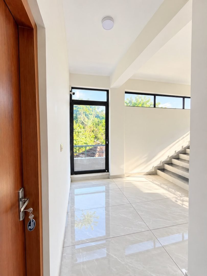 Sun-Lit Stairwell with Panoramic Window View
